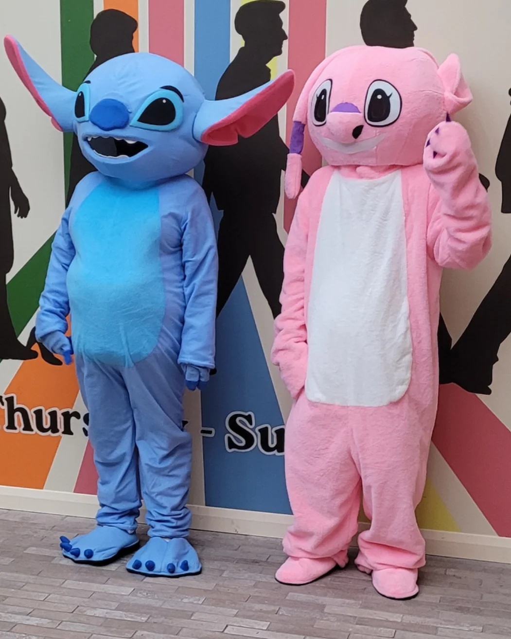 Two animated Paw Patrol character mascots together
